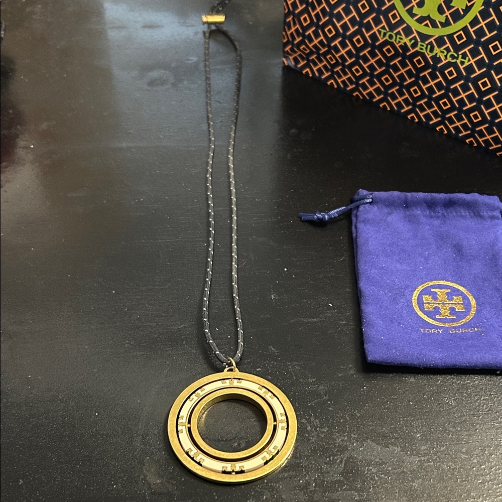 Tory Burch Navy and Gold Spinner Pendant Necklace, 24” - Picture 7 of 7